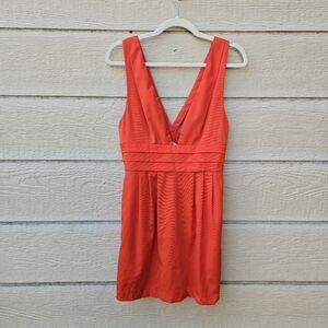 Free People orange deep v mini dress with pockets size 8